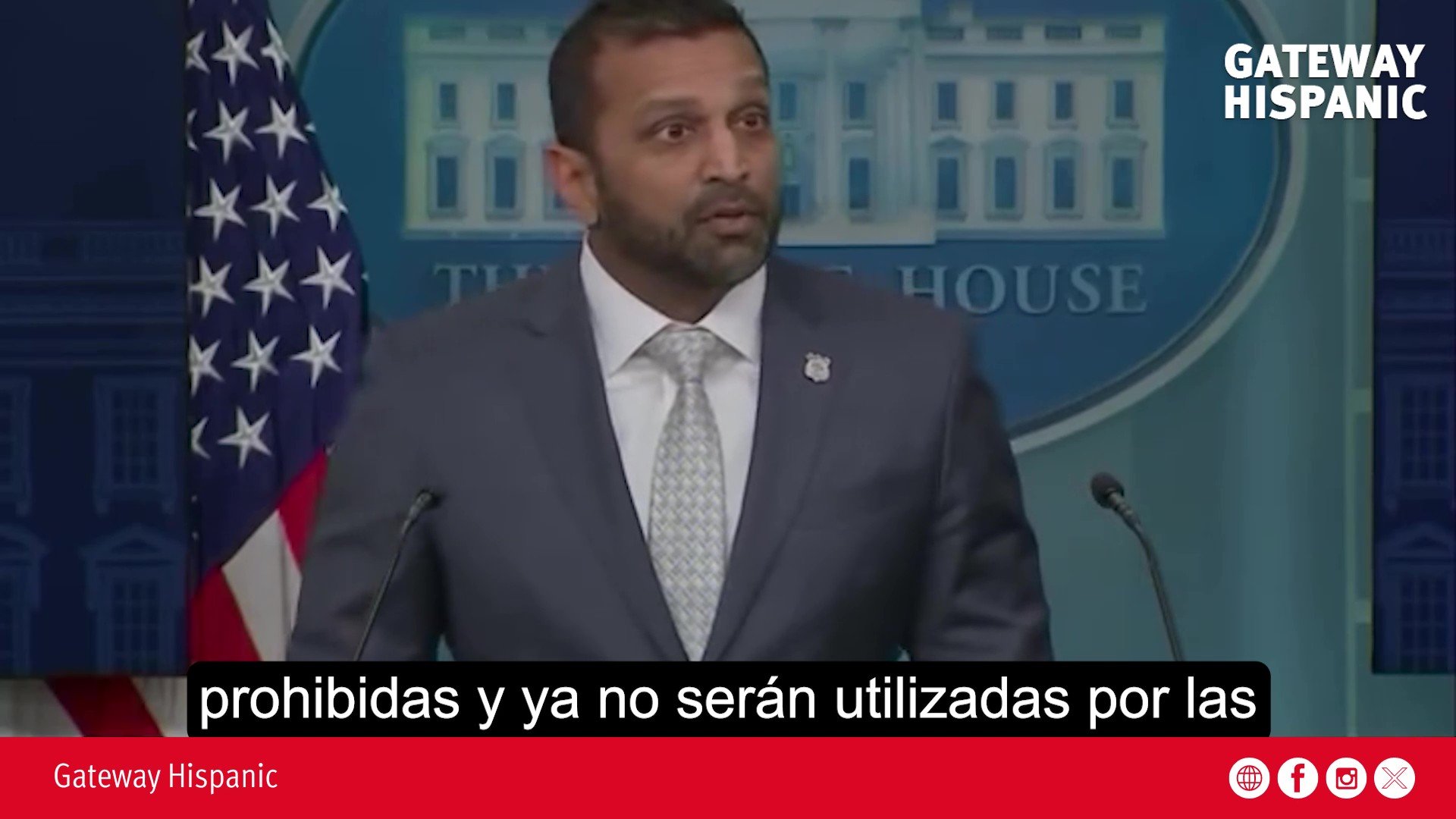 Press briefing at the White House featuring Kash Patel discussing prohibited actions, with the American flag in the background.