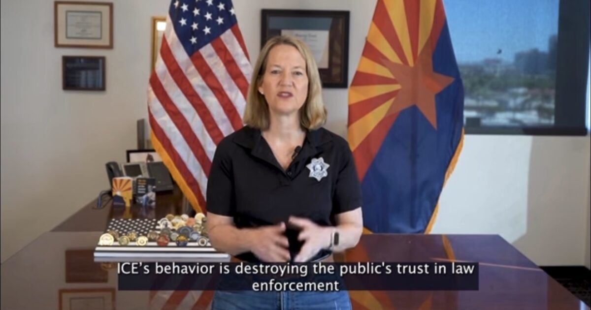 Official speaking against ICE's impact on public trust in law enforcement, with Arizona state flag in the background.
