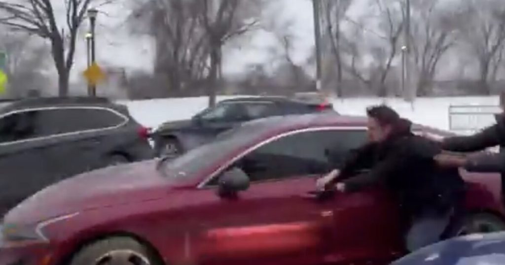 WATCH: Somali Woman Robs Independent Journalist Nick Sortor in Minneapolis Then Drives Off, Dragging Him Down the Street Before Leftists Surround and Threaten Him – FBI Responds!