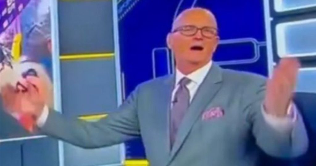 ‘OH!’ ESPN host has hilarious reaction when gay dudes pop up on NYE kiss cam