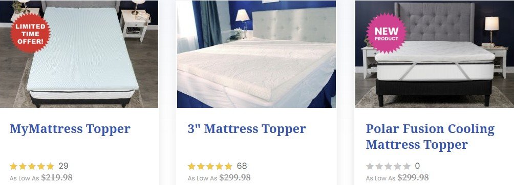 Three mattress toppers on display, including MyMattress Topper, 3" Mattress Topper, and Polar Fusion Cooling Mattress Topper, showcasing various features and prices.