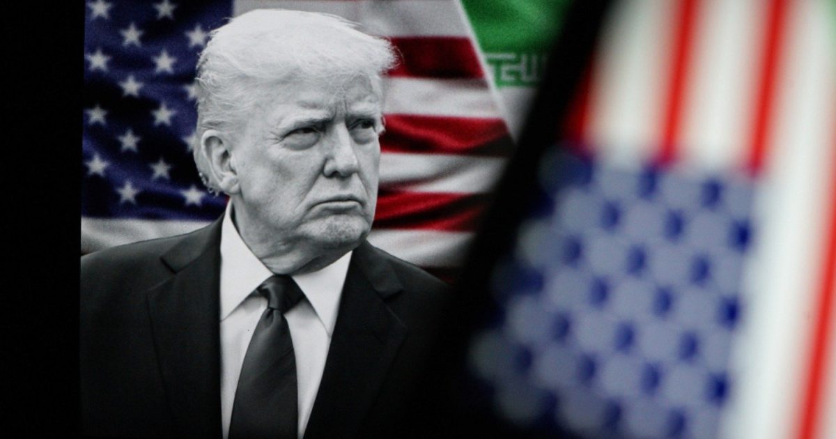 Black and white image of Donald Trump with American flags in the background, symbolizing political themes and national identity.