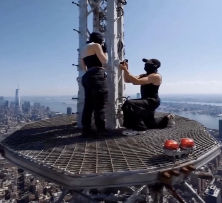 WATCH: Daredevil Couple Scales Empire State Building Spire For Heart-Stopping Proposal, Gets Arrested